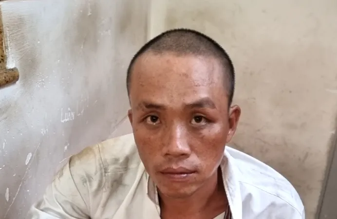 Nghi phạm Hoàng tại cơ quan công an