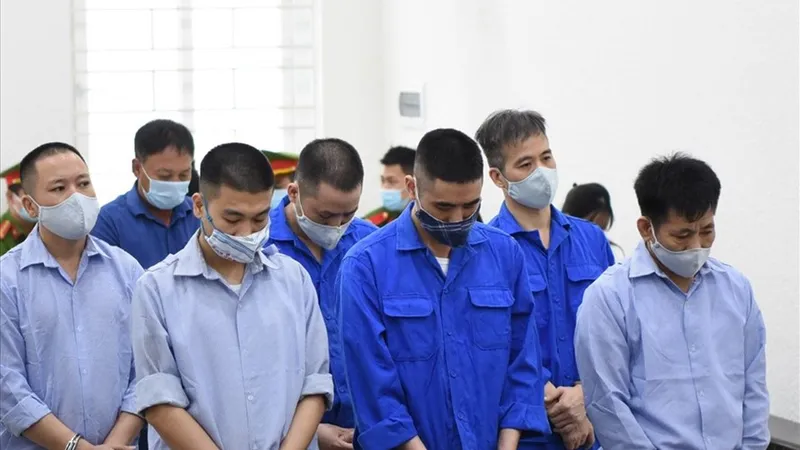Các bị cáo tại tòa ngày 20-7
