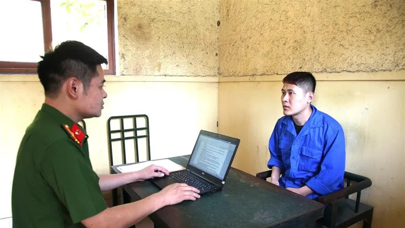 Đinh Văn Vương tại cơ quan công an