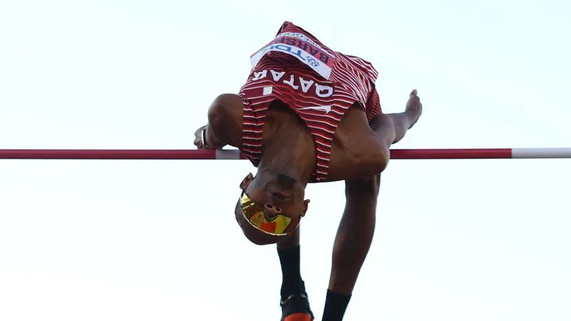 Barshim thanh thoát vượt qua mức xà 2 mét 37