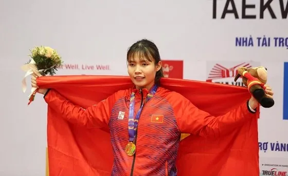 Võ sĩ taekwondo Bạc Thị Khiêm là người sẽ tham gia cầm cờ Đoàn thể thao Việt Nam tại lễ khai mạc ASIAD 19. Ảnh: LƯỢNG 