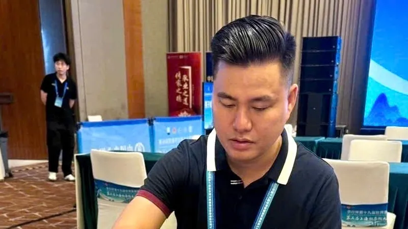 Lại Lý Huynh đã là nhà vô địch thế giới của cờ tướng Việt Nam. Ảnh: MINH THẮNG