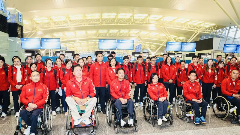 Thành viên Đoàn thể thao người khuyết tật Việt Nam tự tin tham dự ASEAN Para Games 13. Ảnh: LƯỢNG LƯỢNG