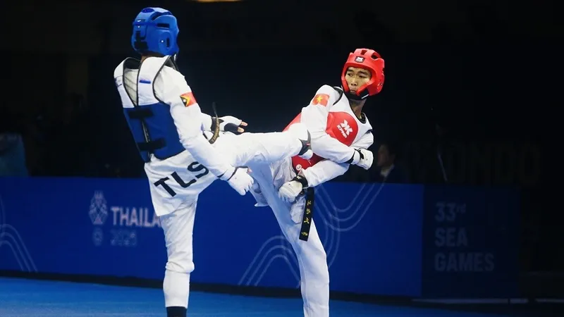Nguyễn Hồng Trọng (đỏ) là 1 trong những võ sĩ của taekwondo Việt Nam được cử tới Mỹ thi đấu. Ảnh: DŨNG PHƯƠNG