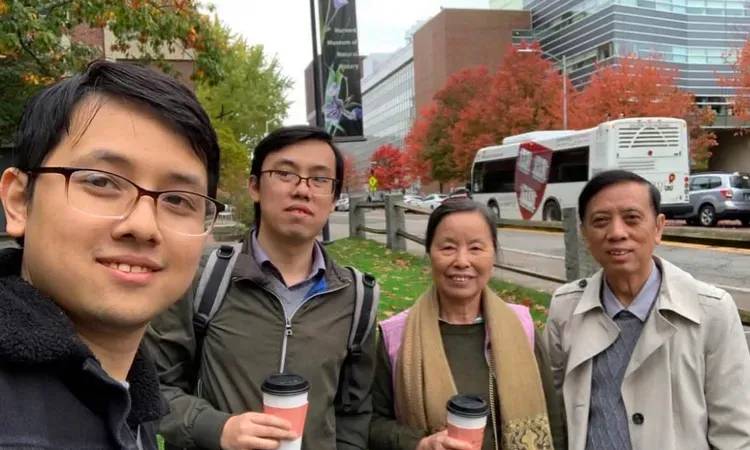 Prof Hoang Van Kiem and his wife with their two sons, Dr Hoang Trong Nghia (second on the left) and Dr Hoang Quang Minh (Photo: SGGP)