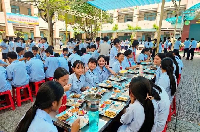Students at Ho Van Long Junior High School in Binh Tan Ward during their lunch break