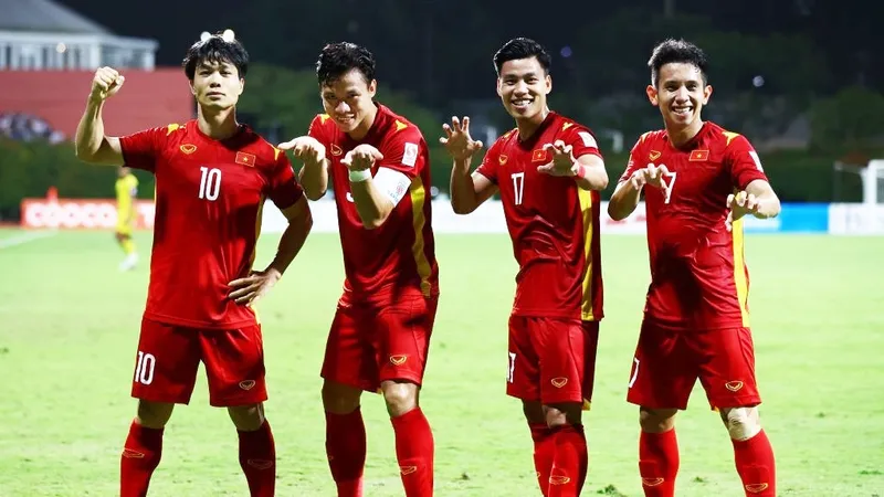 Các tuyển thủ Việt Nam ăn mừng chiến thắng. Ảnh: Getty