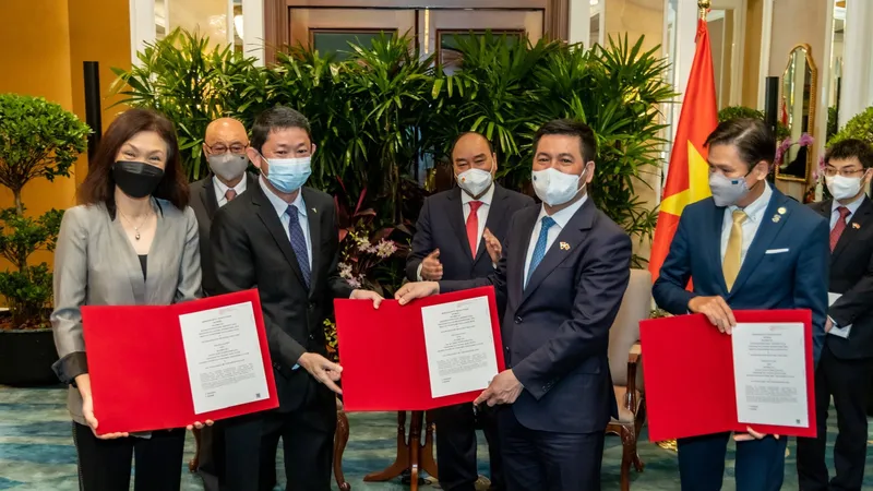 Nghi thức ký kết MOU thành lập Trung tâm Đổi mới sáng tạo Công nghiệp 4.0 Việt Nam Singapore giữa Becamex IDC, VSIP, EIU, SPI và SiTA trước sự chứng kiến của Chủ tịch nước Nguyễn Xuân Phúc 