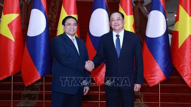 Thủ tướng Phạm Minh Chính hội kiến Thủ tướng Lào Sonexay Siphandone vào tháng 4 vừa qua. Ảnh: TTXVN