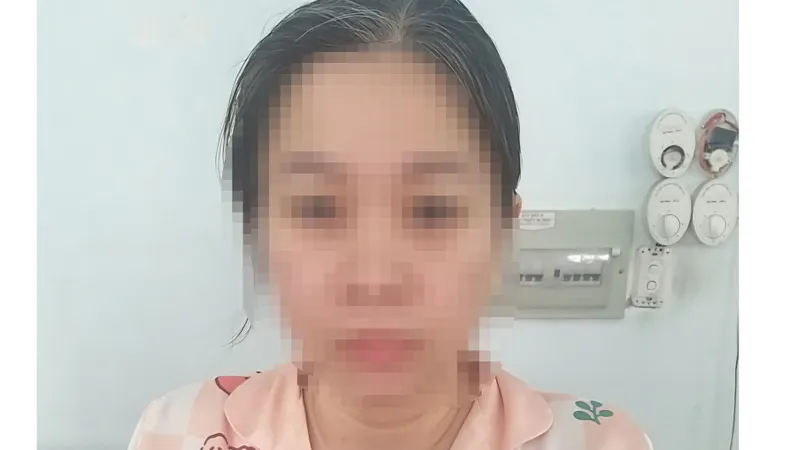 Bảo mẫu Nguyễn Thị Ngọc Cẩm tại cơ quan công an