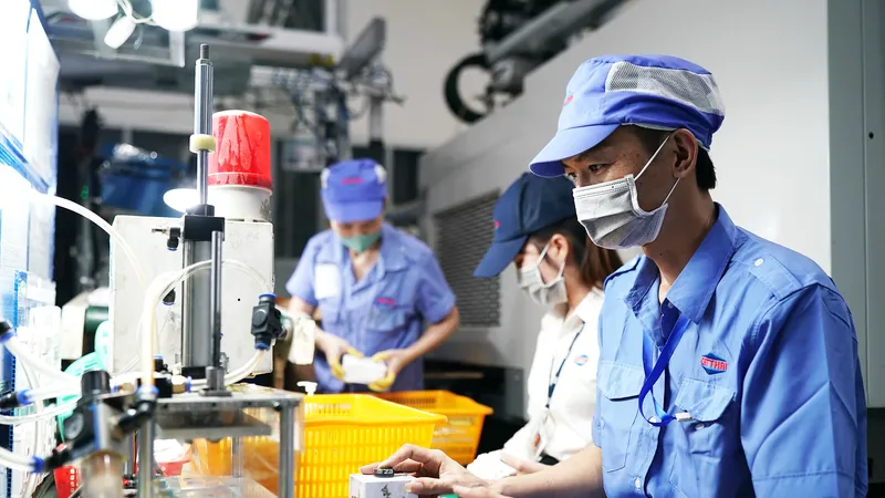 Công ty TNHH Sản xuất thương mại Cát Thái gia công chi tiết phụ trợ tại Khu công nghệ cao TPHCM. Ảnh: HOÀNG HÙNG