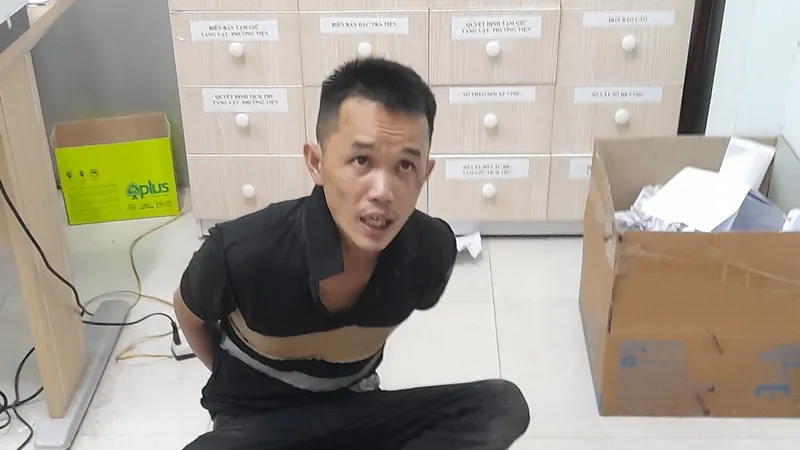 Đối tượng Minh tại cơ quan công an