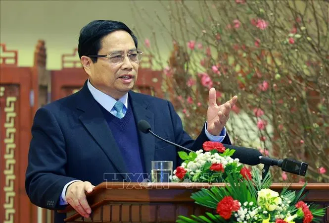 Thủ tướng Phạm Minh Chính chúc mừng năm mới và giao nhiệm vụ cho ngành ngân hàng, ngày 3-2. Ảnh: TTXVN