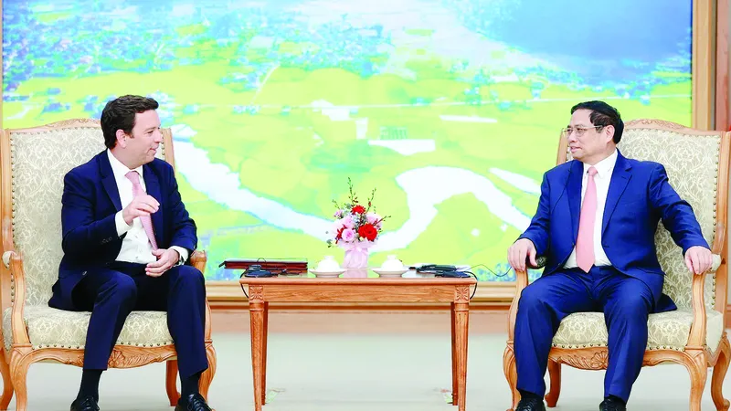 Thủ tướng Phạm Minh Chính tiếp Chủ tịch Hội đồng quản trị kiêm Tổng Giám đốc điều hành toàn cầu Tập đoàn Abbott (Hoa Kỳ) Robert Ford. Ảnh: TTXVN