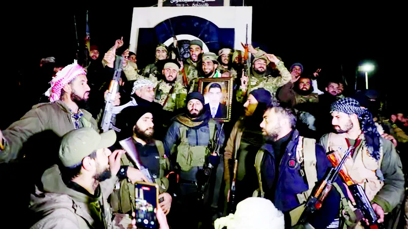 Lực lượng đối lập Syria sau khi chiếm thủ đô Damascus, Syria. Ảnh: REUTERS