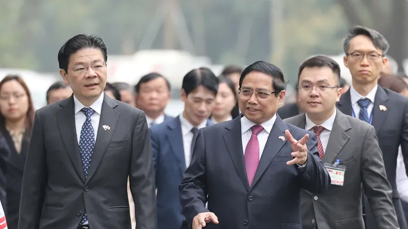 Thủ tướng Phạm Minh Chính chủ trì lễ đón Thủ tướng Cộng hòa Singapore Lawrence Wong. Ảnh: QUANG PHÚC