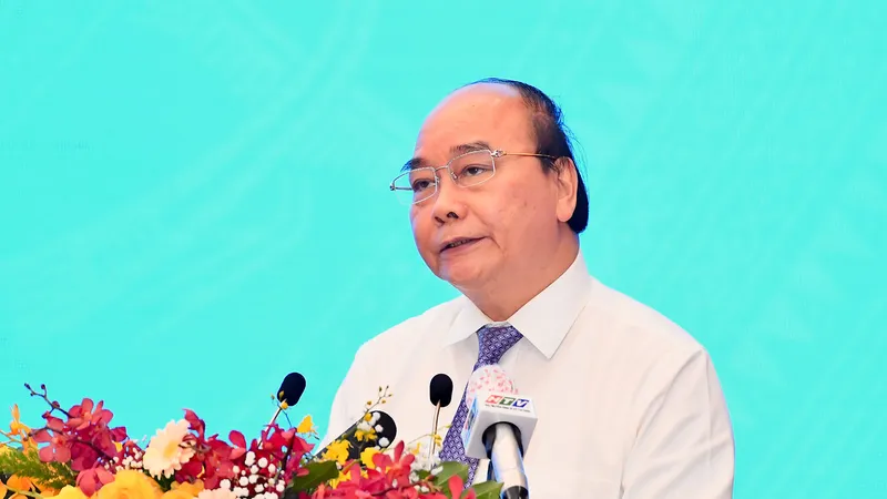 Chủ tịch nước Nguyễn Xuân Phúc phát biểu tại Hội thảo. Ảnh: VIỆT DŨNG