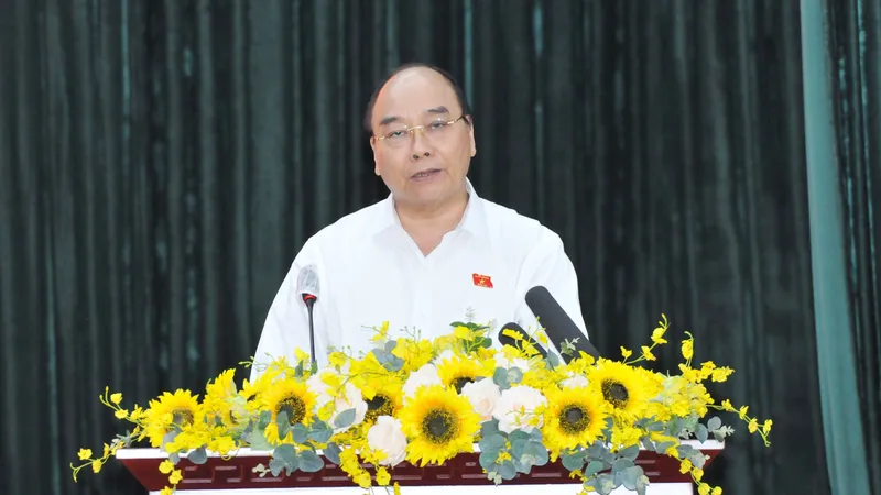 Chủ tịch nước Nguyễn Xuân Phúc phát biểu tại buổi tiếp xúc cử tri các quận 5, 8, 11. Ảnh: CAO THĂNG