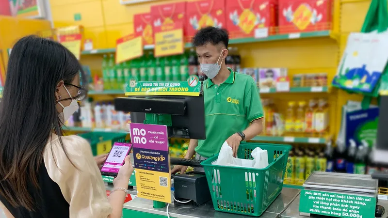 MoMo là ví điện tử đầu tiên tích hợp thanh toán tại chuỗi cửa hàng Bách Hóa Xanh