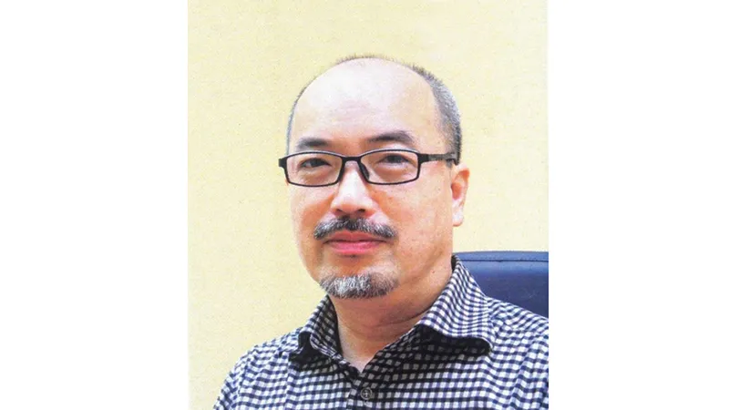 Ông Vi Kiến Thành