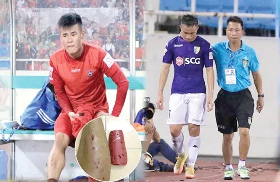 Sầm Ngọc Đức (phải) bị treo giò 8 trận