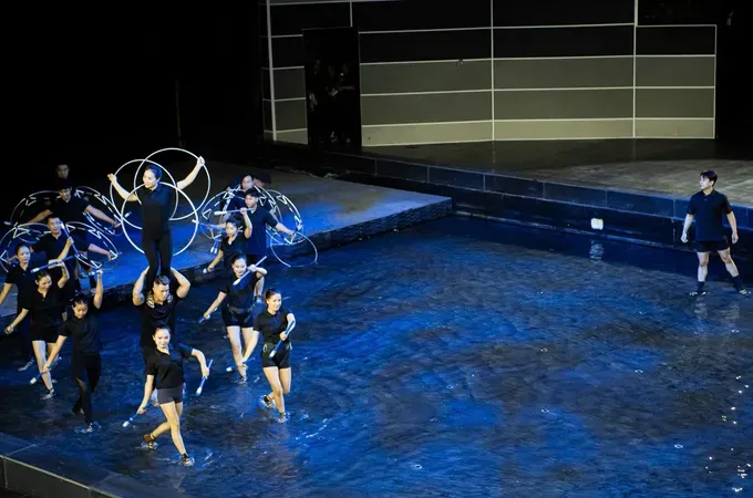 Circus artists rehearse on the water stage of the Phu Tho Circus and Multi-purpose Performance Theater, one of the most modern venues in Vietnam today dedicated to circus arts. (Photo: SGGP)