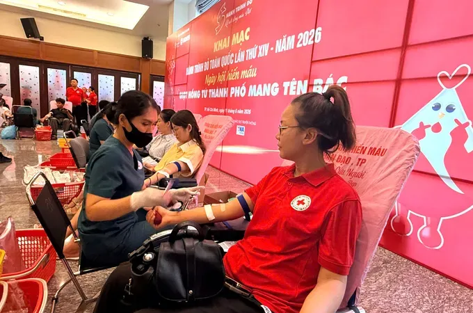 Volunteers participate in a blood donation drive on June 11.