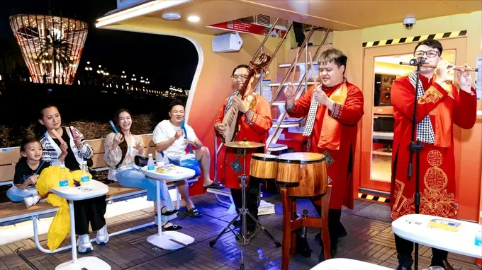 Tourists enjoy music aboard Saigon WaterGO. (Photo; SGGP)
