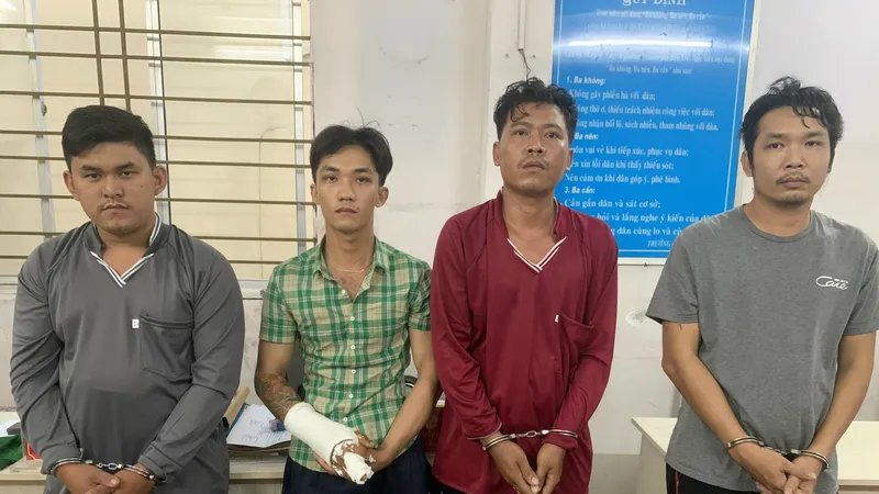 4 bị can gồm Tùng, Lợi, Giang, Đại tại cơ quan công an. Ảnh: QUANG DUY