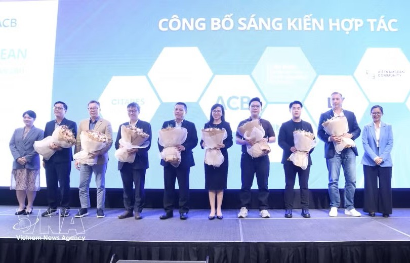 “越南—东盟价值链合作倡议”参与成员合影。图：越通社
