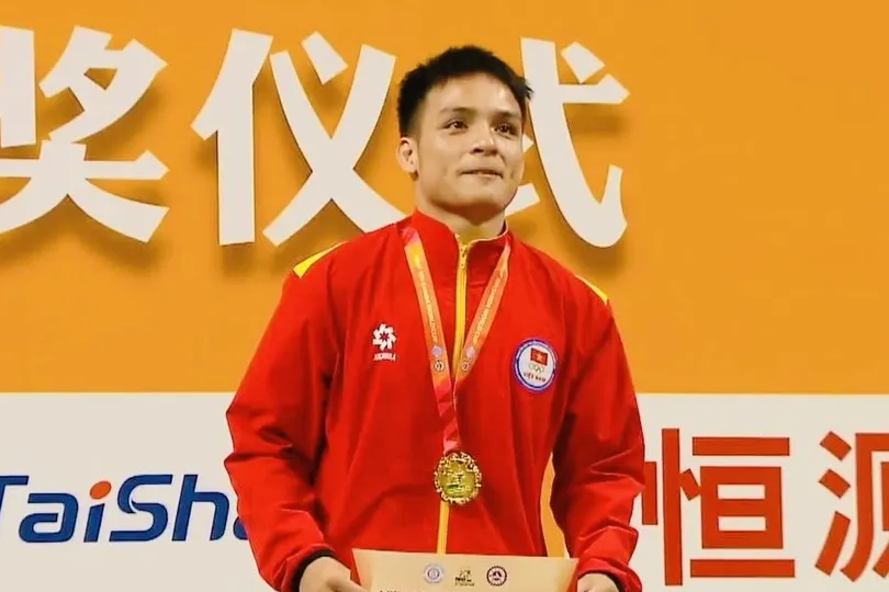 Võ sĩ Đinh Văn Tấm có tấm HCV tại Cúp tán thủ thế giới 2026. Ảnh: IWF