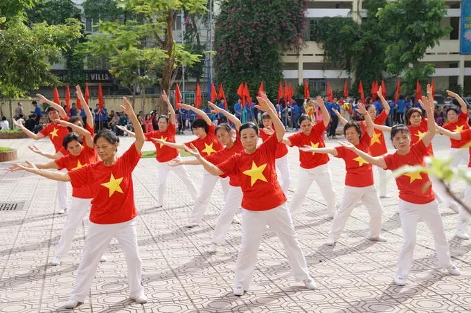 A mass gymnastics performance to passionately enhance health by dedicated members of the women’s union (Photo: SGGP)
