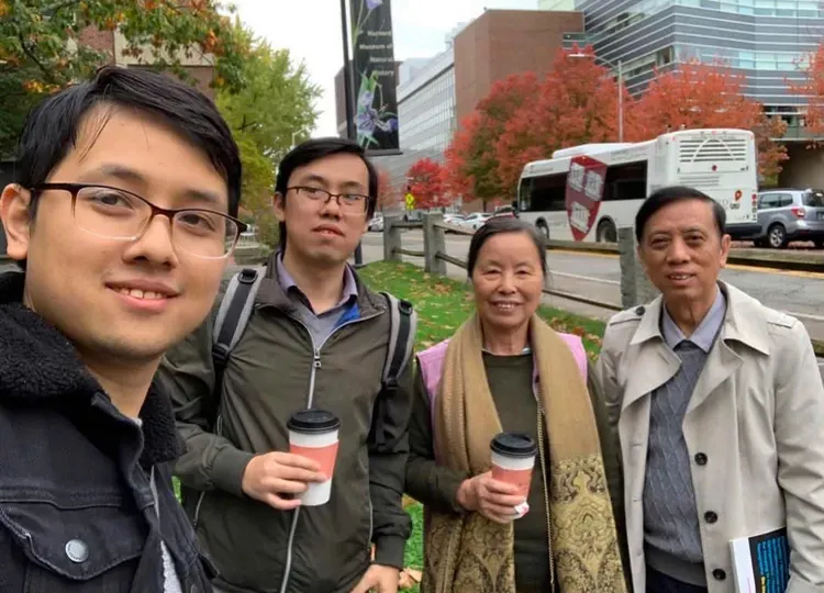 Prof Hoang Van Kiem and his wife with their two sons, Dr Hoang Trong Nghia (second on the left) and Dr Hoang Quang Minh (Photo: SGGP)
