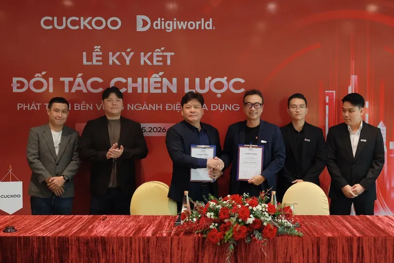Đại diện DGW và Cuckoo Vina ký kết hợp tác.