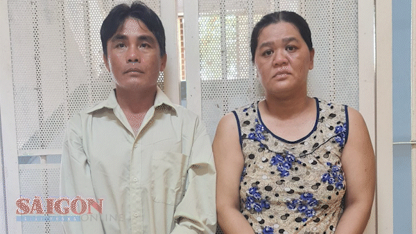 Vợ chồng Nguyễn Thanh Đức - Nguyễn Thị Thu Vân tại cơ quan công an.
