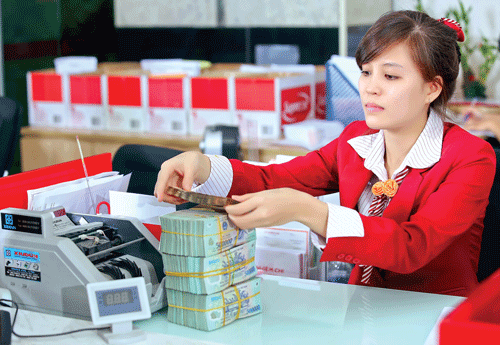 Cần tạo thuận lợi cho các doanh nghiệp nhỏ và vừa tiếp cận vốn tín dụng. Ảnh: LONG THANH Cần tạo thuận lợi cho các doanh nghiệp nhỏ và vừa tiếp cận vốn tín dụng. Ảnh: LONG THANH