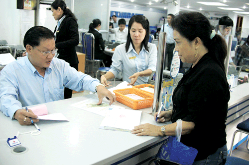 Tái cấu trúc hệ thống là nhu cầu cấp thiết của ngành ngân hàng hiện nay. Ảnh: LÃ ANH Tái cấu trúc hệ thống là nhu cầu cấp thiết của ngành ngân hàng hiện nay. Ảnh: LÃ ANH