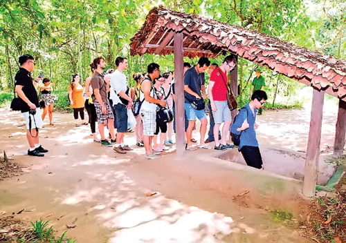 Địa đạo Củ Chi - một căn cứ cách mạng thời kháng chiến - nay là điểm đến yêu thích của du khách.