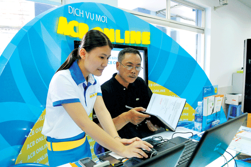 Dịch vụ ACB Online với nhiều tính năng, tiện ích mới vượt trội dành cho khách hàng. Ảnh: VIỆT DŨNG Dịch vụ ACB Online với nhiều tính năng, tiện ích mới vượt trội dành cho khách hàng. Ảnh: VIỆT DŨNG