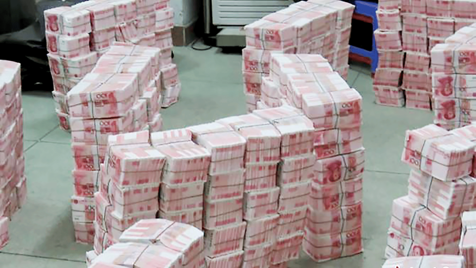 Tiền giả tổng trị giá 214 triệu nhân dân tệ (khoảng 33,2 triệu USD) bị thu giữ ở tỉnh Quảng Đông, Trung Quốc. Ảnh: CNS  ​