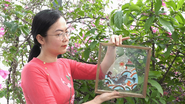 Tet blessings with folk art on Bodhi leaf skeletons