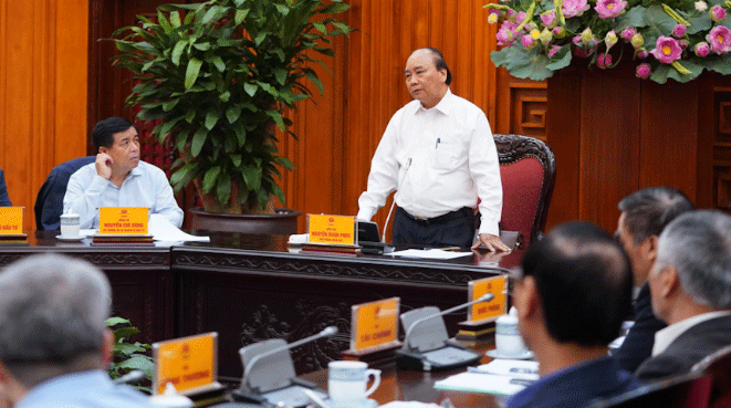  Thủ tướng Nguyễn Xuân Phúc chủ trì cuộc họp với các bộ, ngành liên quan nhằm chuẩn bị cho kỳ họp lần thứ 43 Ủy ban liên Chính phủ Việt Nam và Lào. Ảnh: VGP