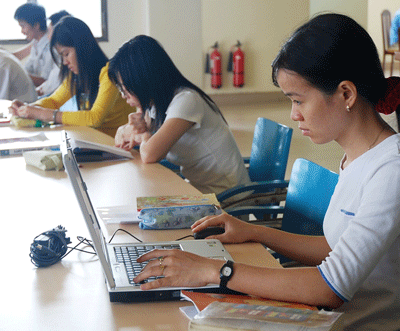 Students at the library of the Vietnam National University in Ho Chi Minh City (Photo: SGGP)