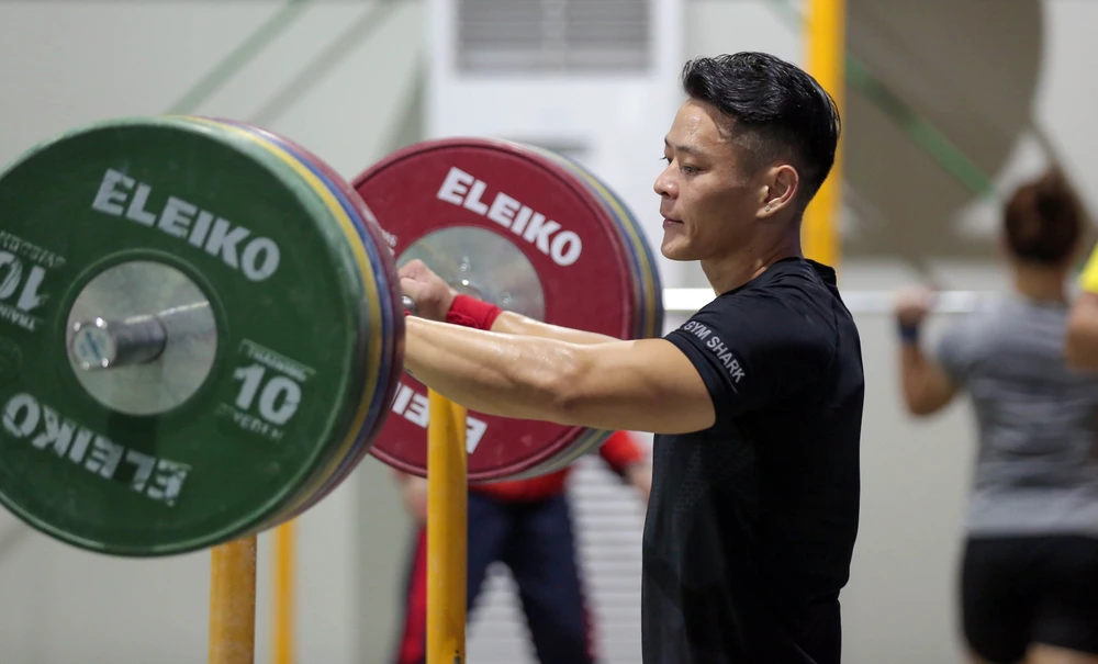 Chờ nữ lực sĩ Vương Thị Huyền đoạt HCV đầu tiên cho Việt Nam ảnh 9 Chờ nữ lực sĩ Vương Thị Huyền đoạt HCV đầu tiên cho Việt Nam ảnh 9