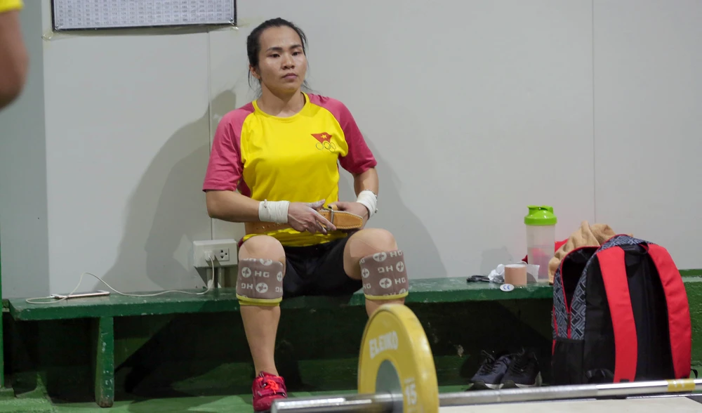 Chờ nữ lực sĩ Vương Thị Huyền đoạt HCV đầu tiên cho Việt Nam ảnh 3 Chờ nữ lực sĩ Vương Thị Huyền đoạt HCV đầu tiên cho Việt Nam ảnh 3
