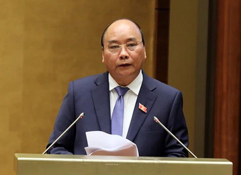 Thủ tướng Chính phủ Nguyễn Xuân Phúc trả lời chất vấn. Ảnh: VGP