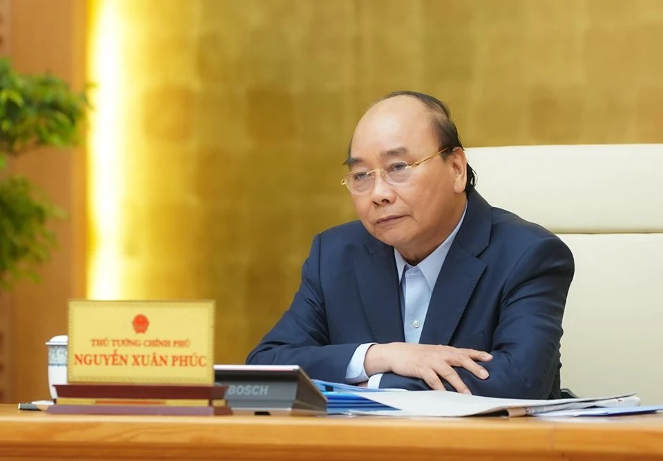 Thủ tướng Nguyễn Xuân Phúc chủ trì họp 15-4. Ảnh: VIẾT CHUNG