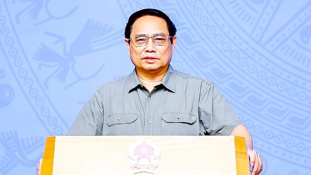 Thủ tướng Phạm Minh Chính phát biểu tại hội nghị tổng kết công tác phòng chống dịch Covid-19 của Ban Chỉ đạo quốc gia phòng chống dịch Covid-19 trực tuyến với các địa phương. Ảnh: VIẾT CHUNG