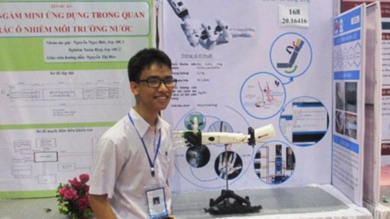 Pham Huy who invents robotic arm to help disabled people eventually gets visa to travel to the US (Photo: SGGP)