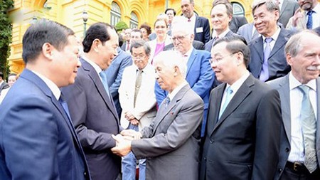 President Tran Dai Quang had an informal meeting with scientists. Photo by VOV.